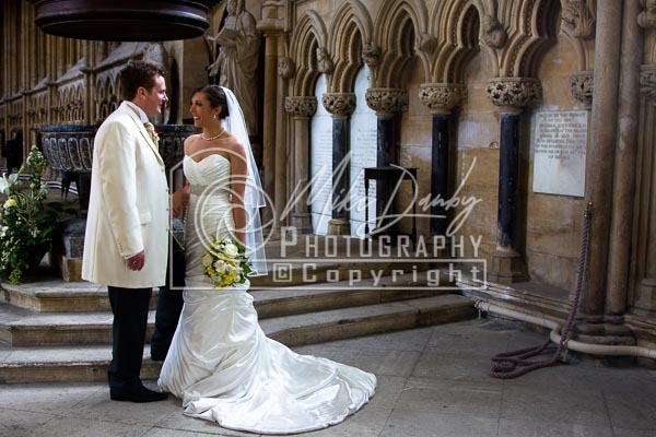 Wedding Couple in Beverley Minster after wedding