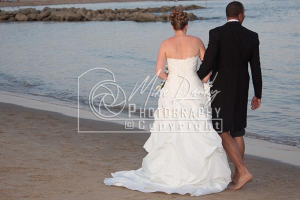 Wedding Couple on beach relaxing