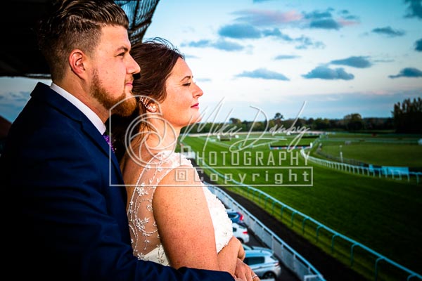 Wedding couple relaxing at Fontwell